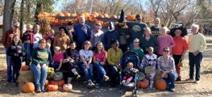 group gathers for fall outing